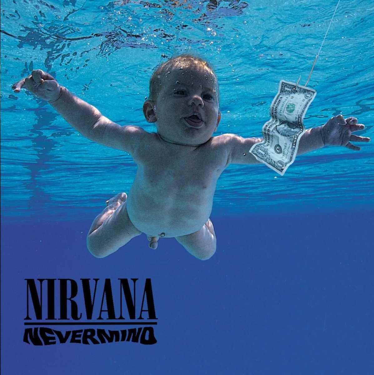Album cover of Nirvana's Nevermind, showing a baby floating underwater in a pool with a dollar bill dangling from a hood in the water before him