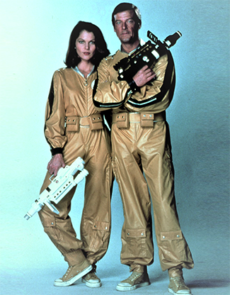 Roger Moore and Lois Chiles in Moonraker costumes