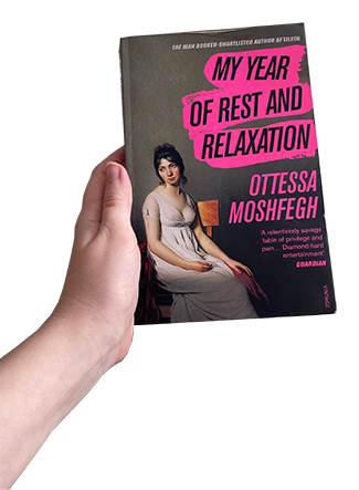 Holding my copy of My Year of Rest and Relaxation