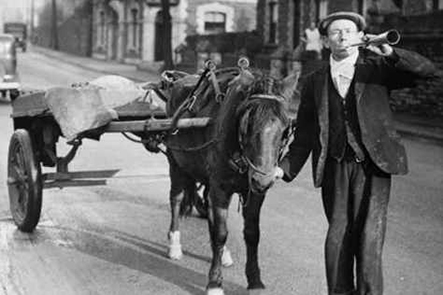 Rag and Bone Man with cart, blowing horn